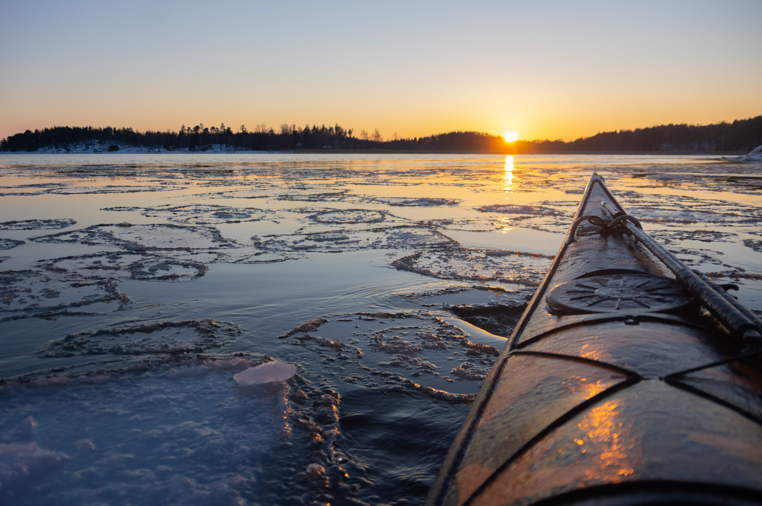 A kayak during sunset in winter